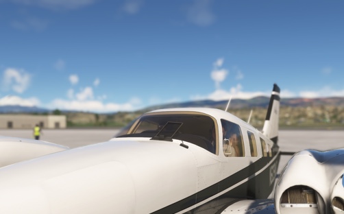 A Piper pa-34 sitting at the airport tarmac